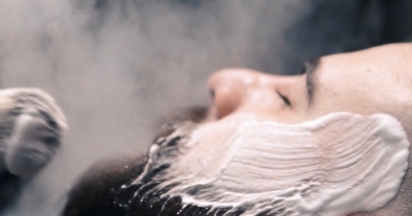 Hot towel shave with shaving cream and steam