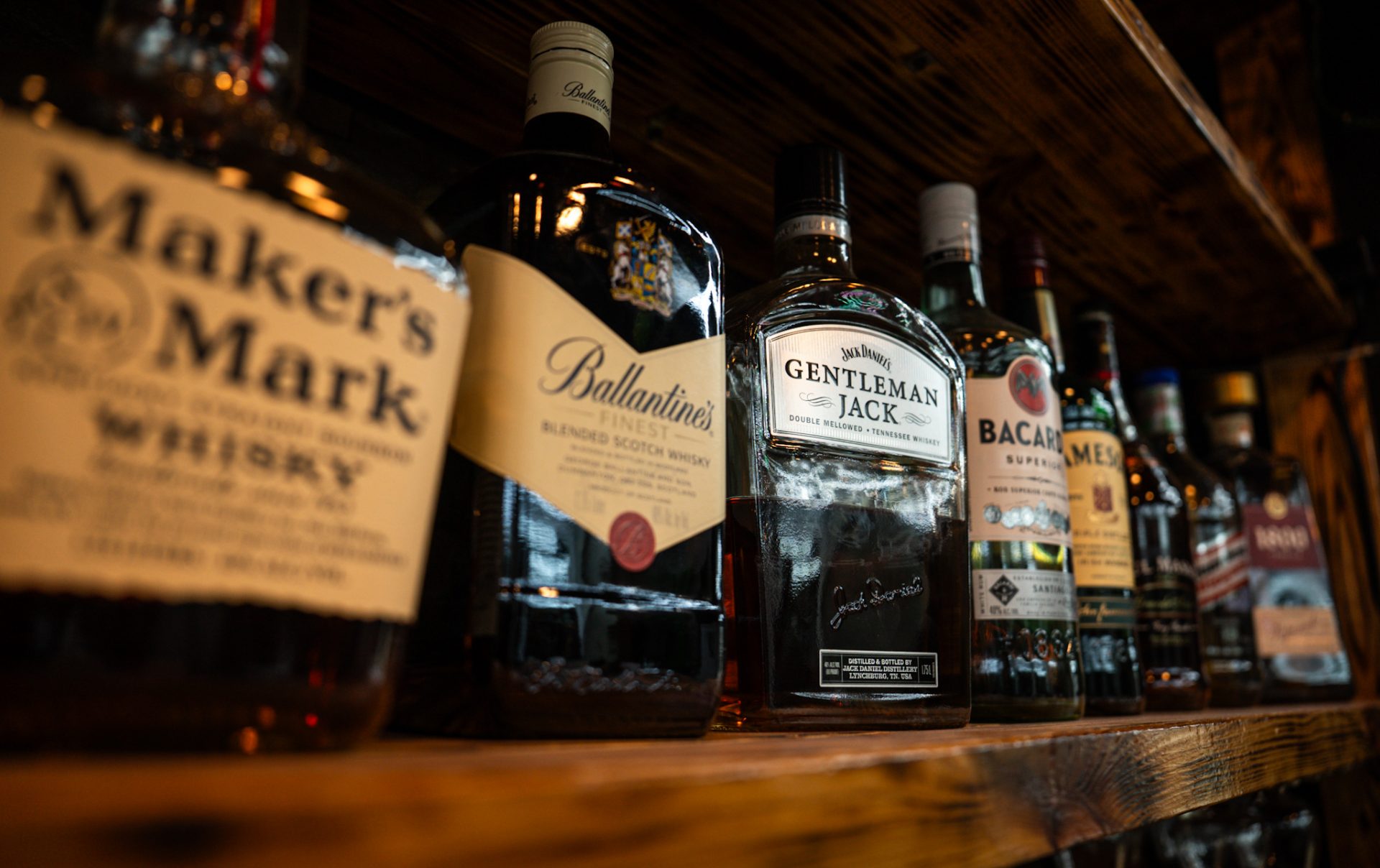 Whiskey bottles on the lounge bar shelf