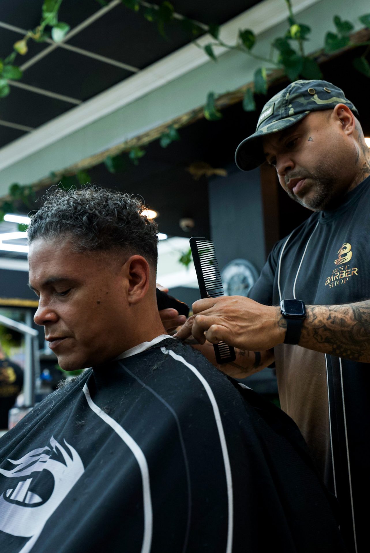 Barber cutting a client’s hair